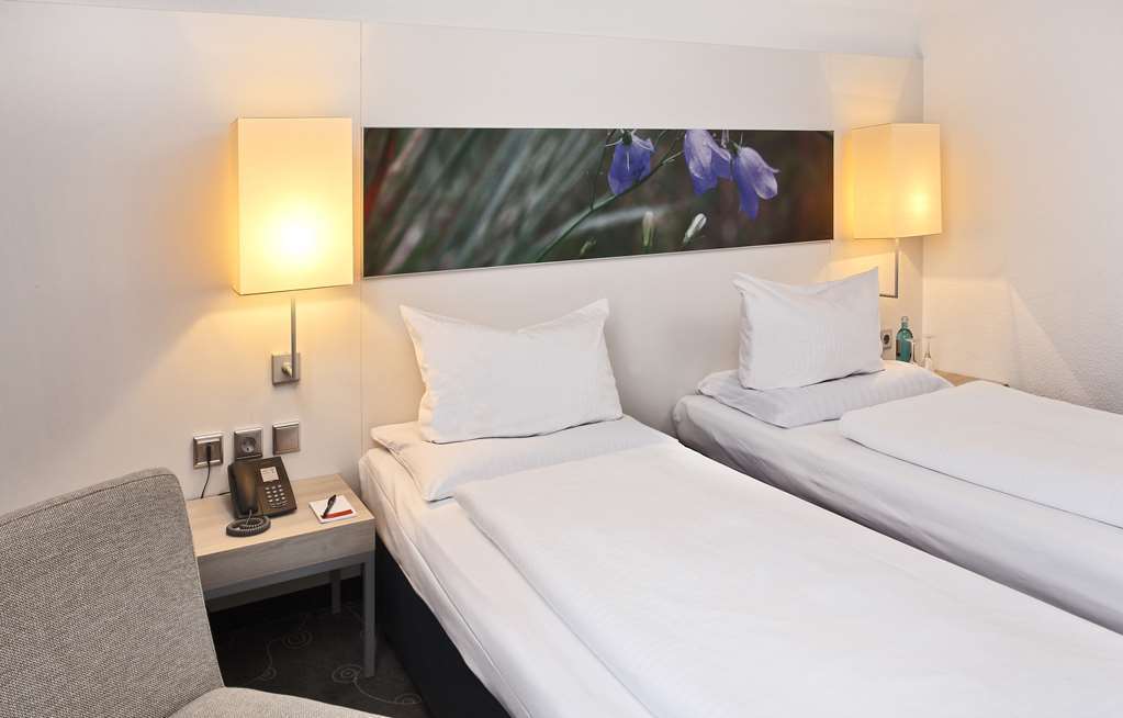 H+ Hotel Siegen Habitación foto